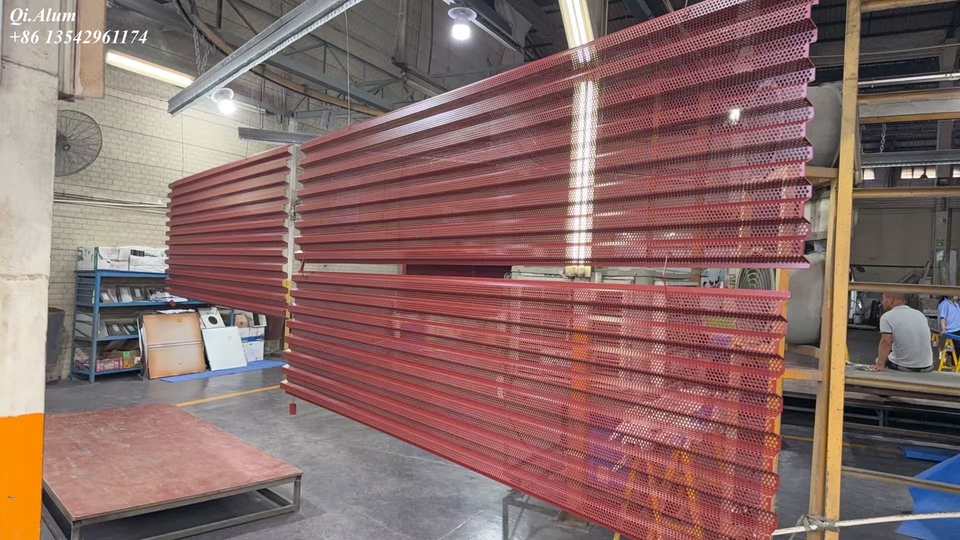 Custom powder coated red metal panels for architectural facades